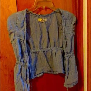 A blue and white hollister shirt